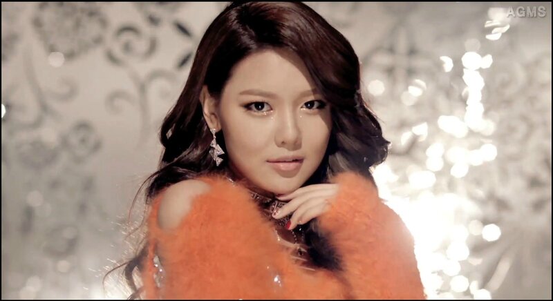 woman in orange fur coat