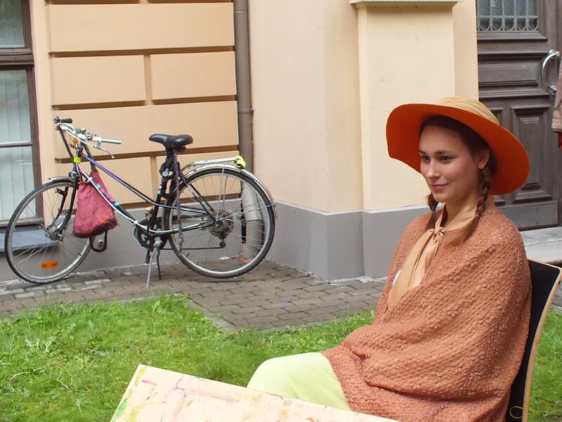 Woman in Orange Hat — Calm