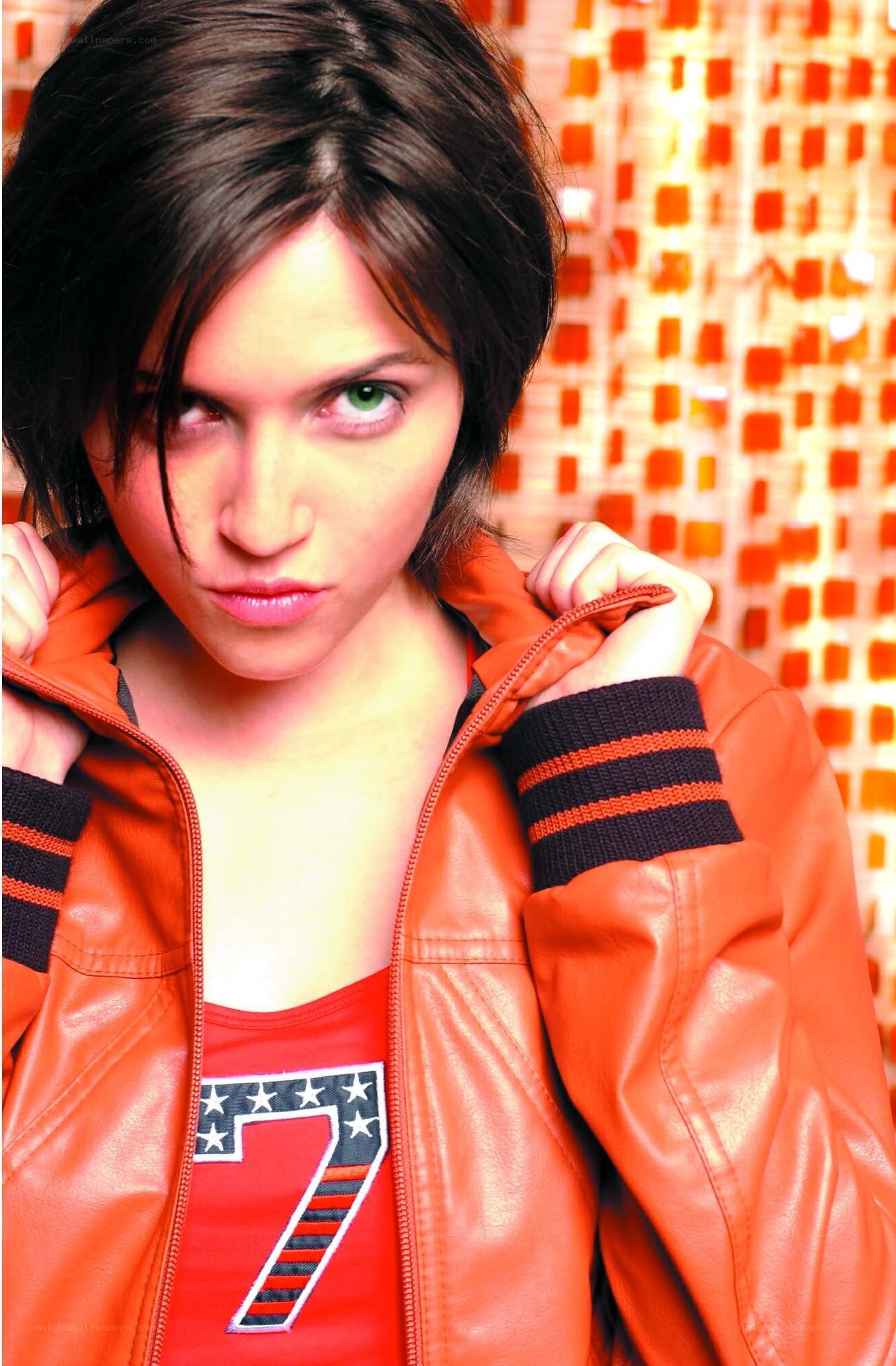 woman in orange jacket