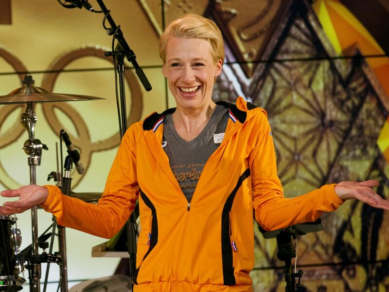 Woman in Orange Jacket — Happy, Photograph