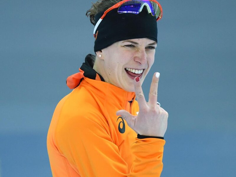 Woman in Orange Jacket — Joyful