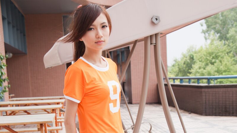 woman in orange jersey