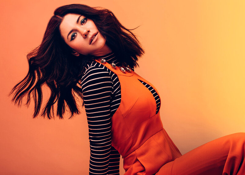 woman in orange jumpsuit