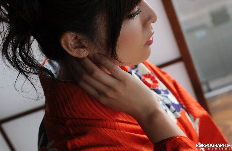 woman in orange kimono