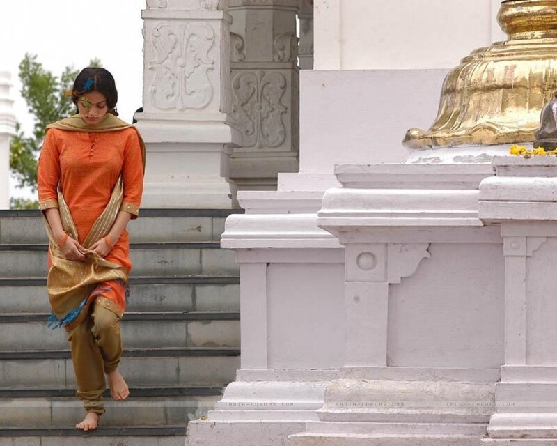 woman in orange salwar kameez
