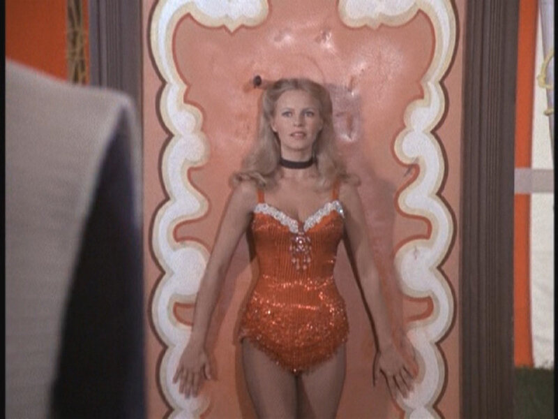 Woman in Orange Sequin Suit
