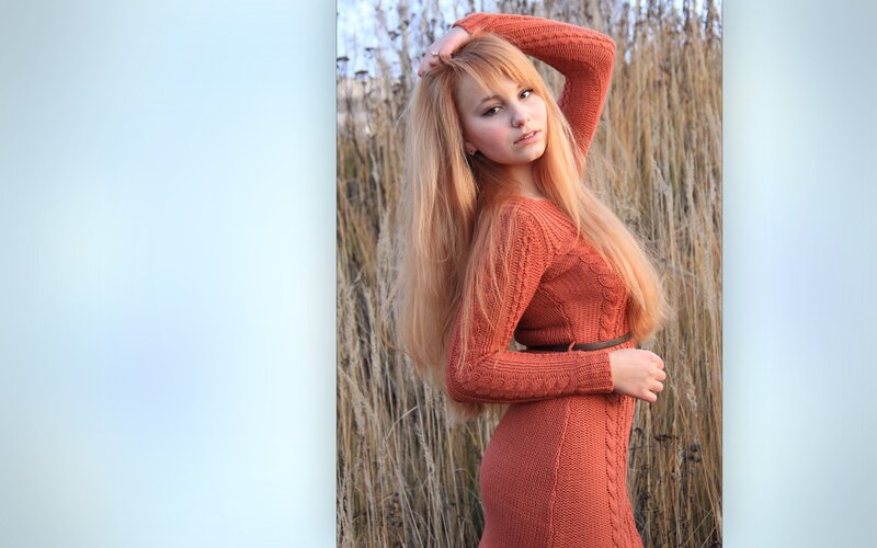 woman in orange sweater