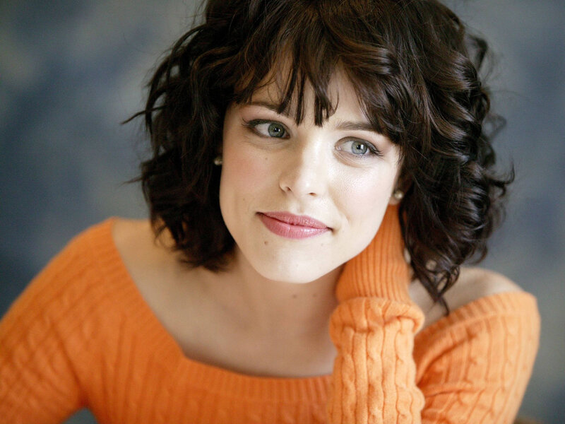 woman in orange sweater