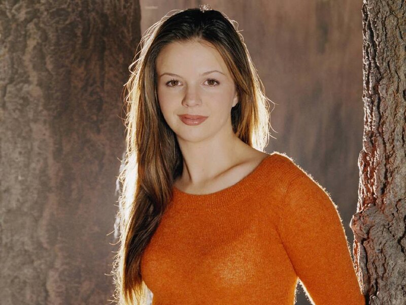 Woman in Orange Sweater — Calm