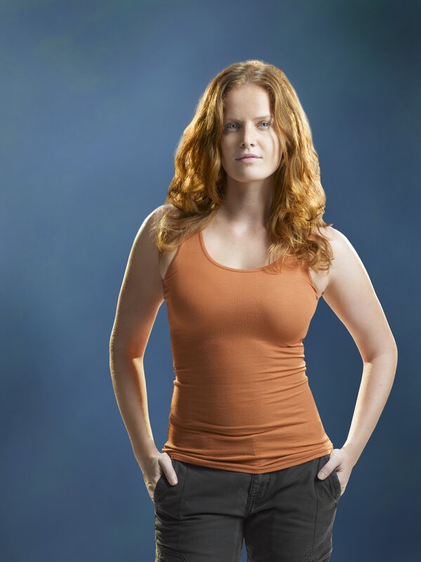 woman in orange tank top