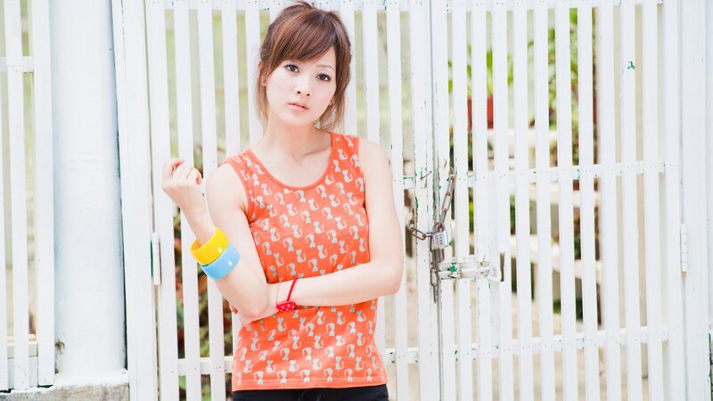 woman in orange tank top