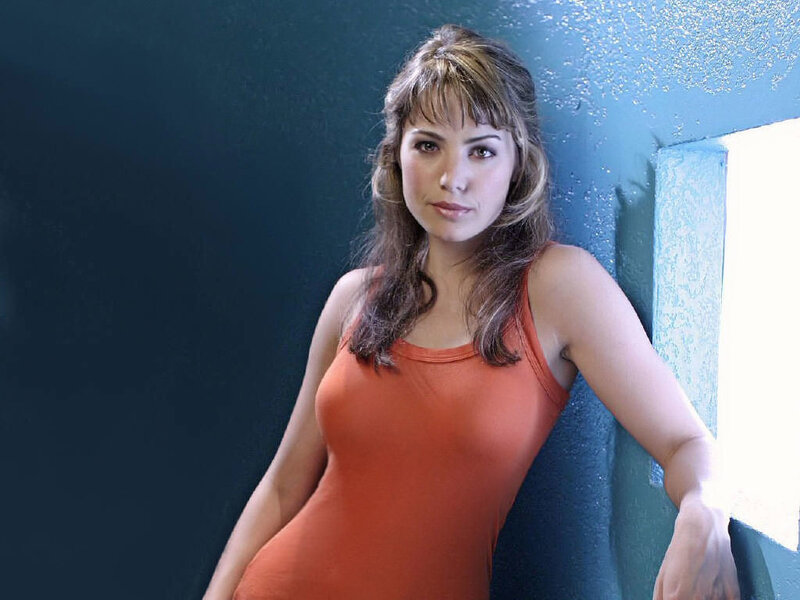 woman in orange tank top