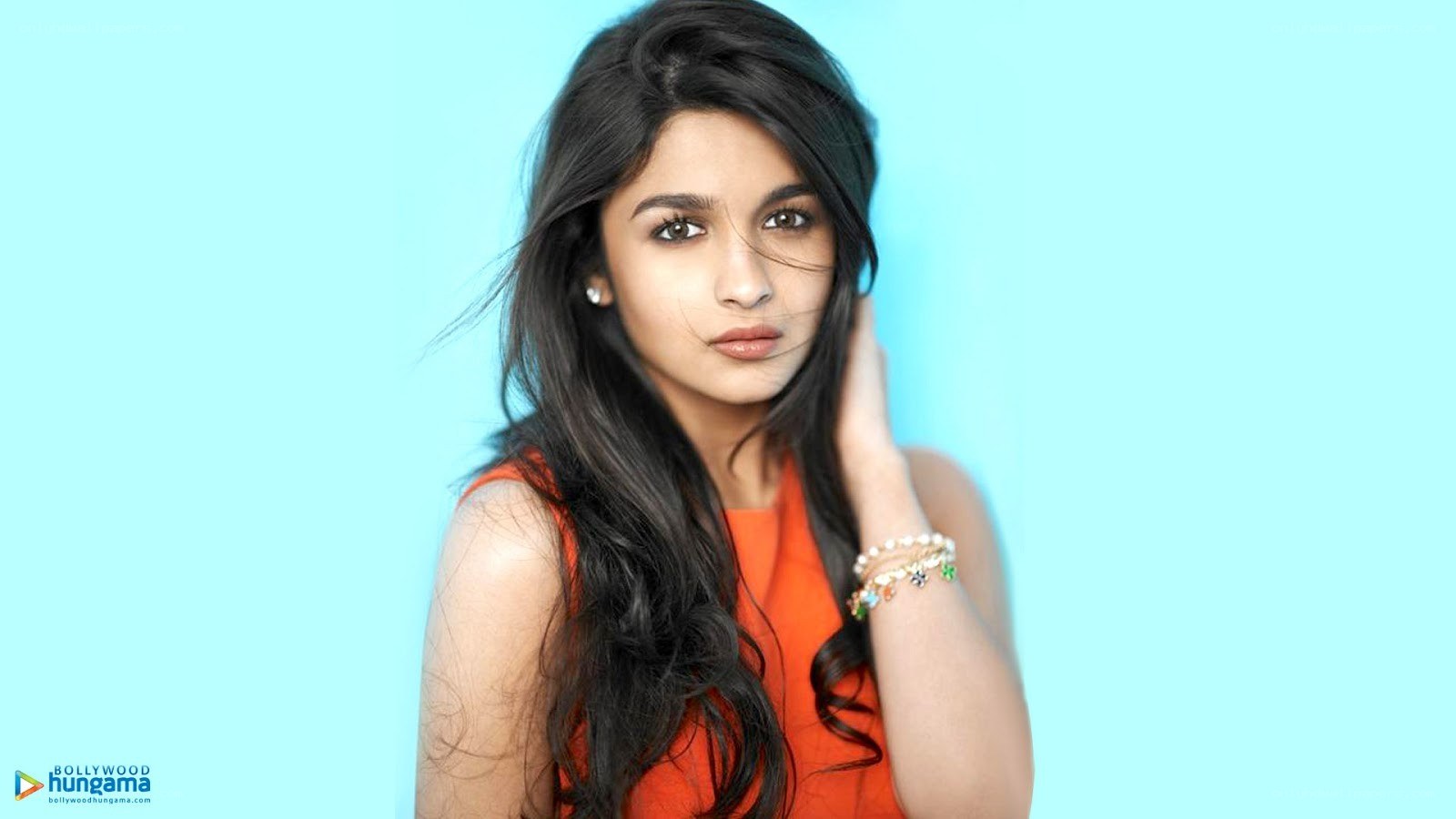 woman in orange top