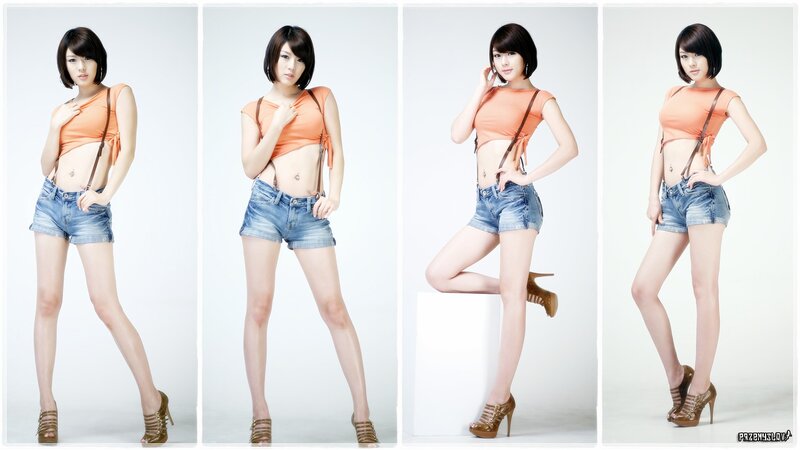 woman in orange top and denim shorts
