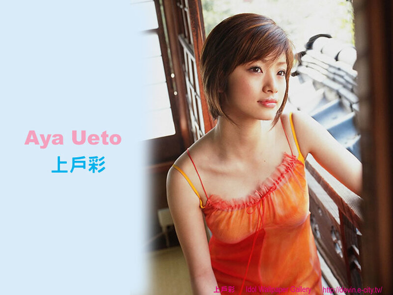 Woman in Orange Top — Calm