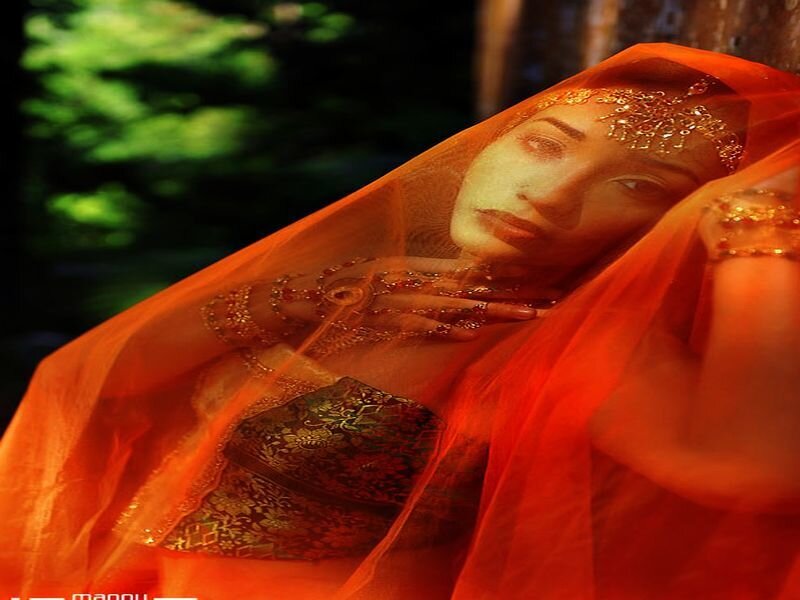 Woman in Orange Veil