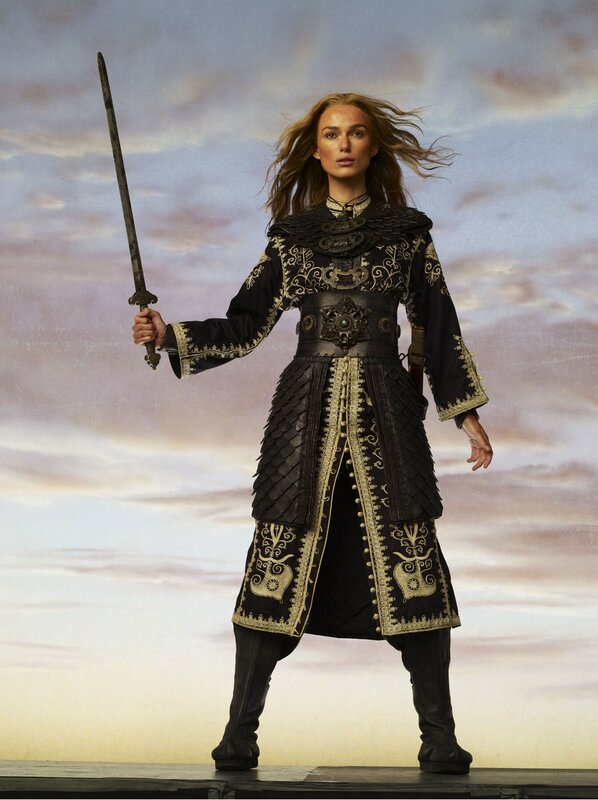 woman in ornate armor with sword