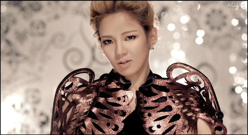 woman in ornate copper outfit