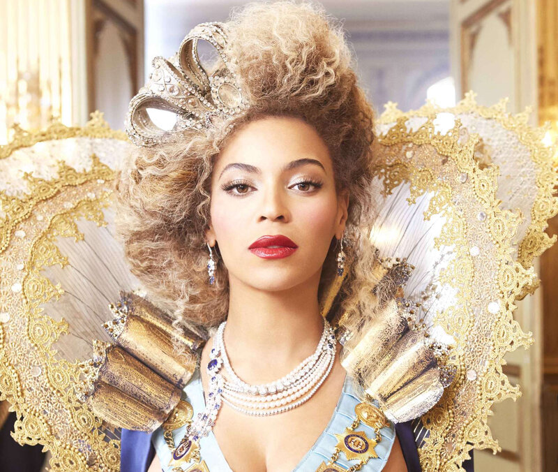 Woman in Ornate Costume — Gold, Regal