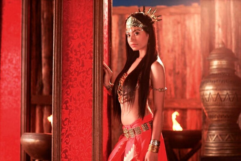 Woman in Ornate Costume — Red, Dramatic