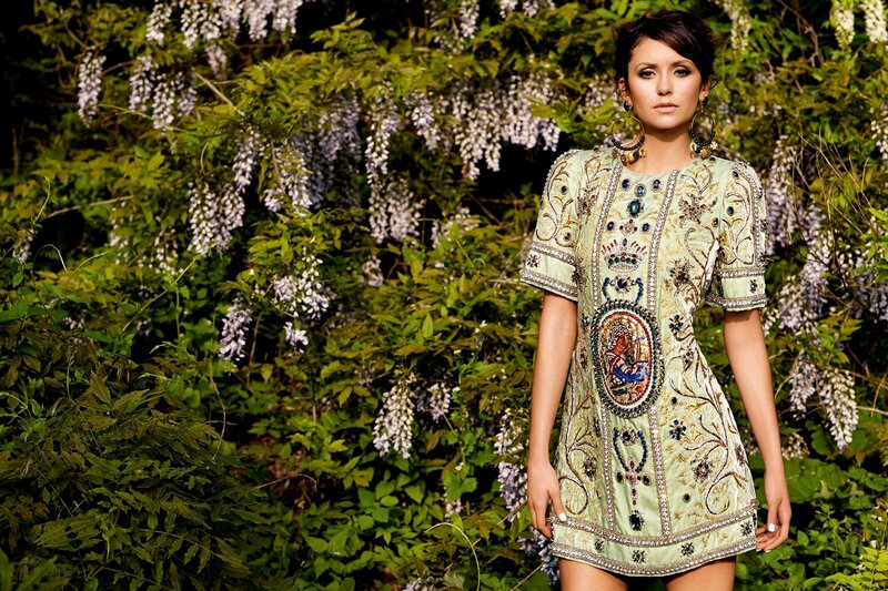 woman in ornate dress outdoors