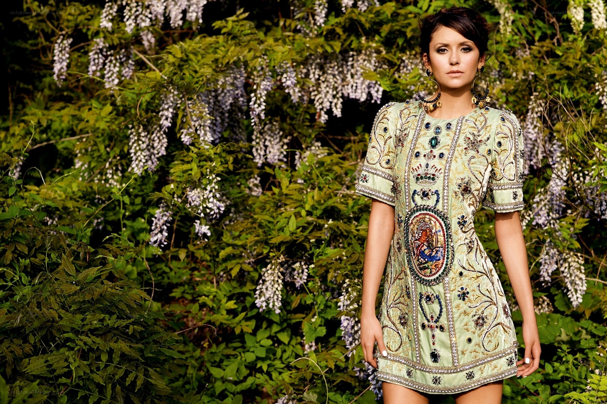 woman in ornate dress outdoors