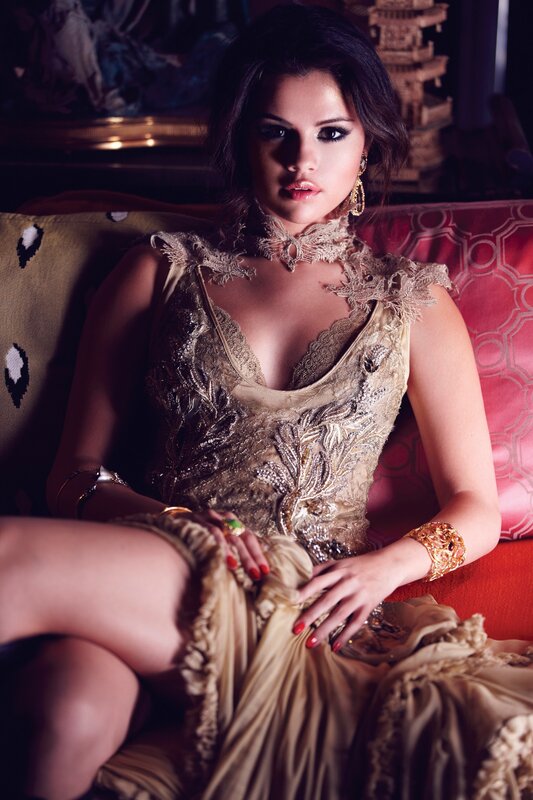 woman in ornate gold dress