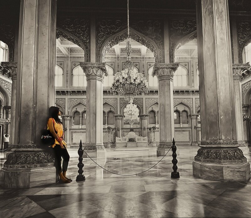 woman in ornate hall