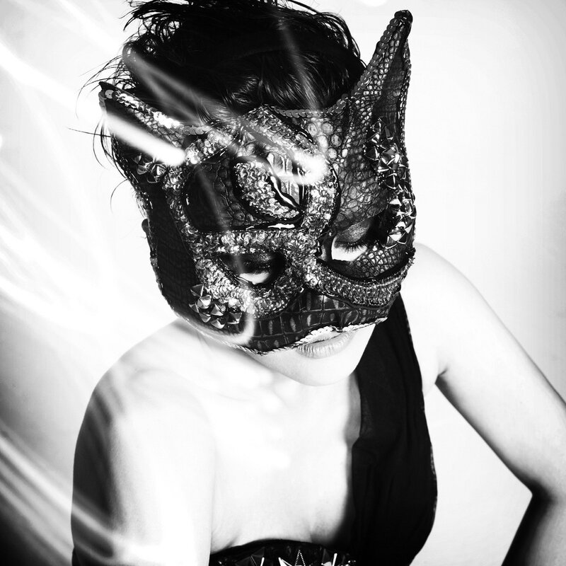 woman in ornate mask