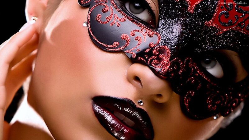 woman in ornate mask