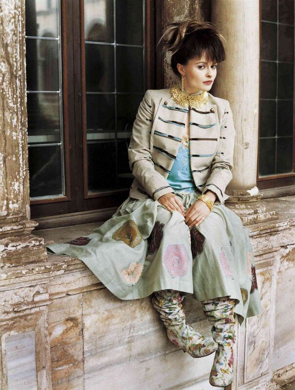woman in ornate outfit sitting