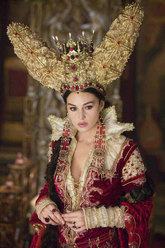 woman in ornate red and gold costume