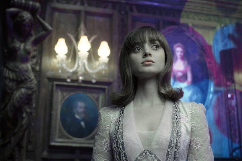 woman in ornate room