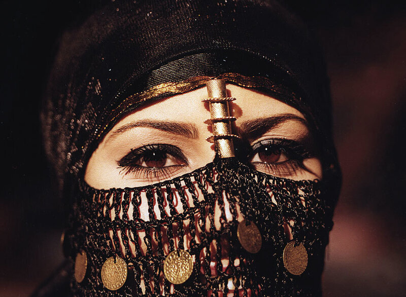 woman in ornate veil