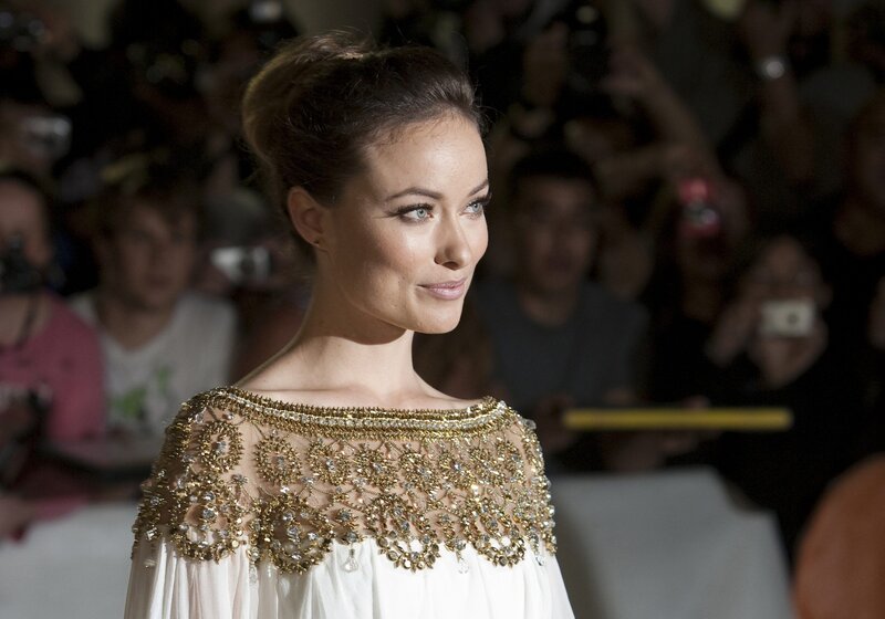 Woman in ornate white gown
