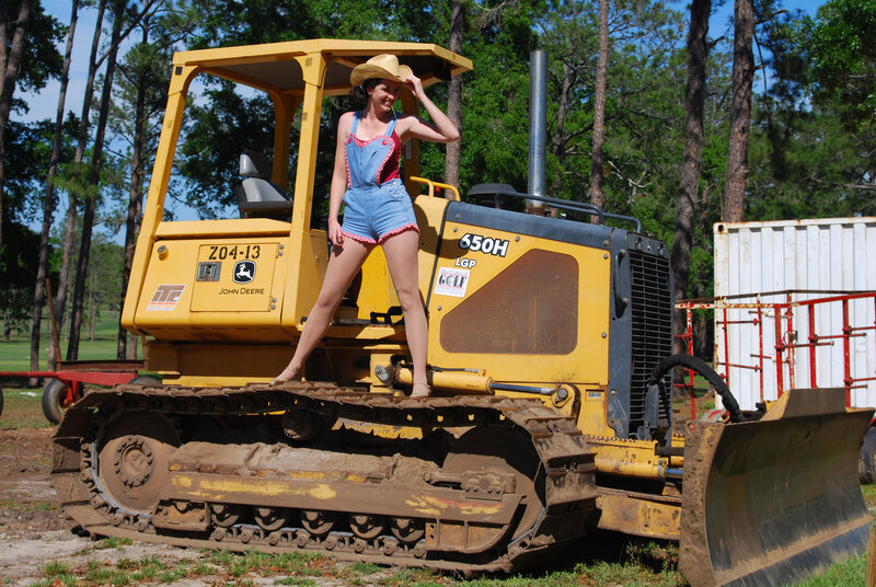 Woman in Overalls on Bulldozer