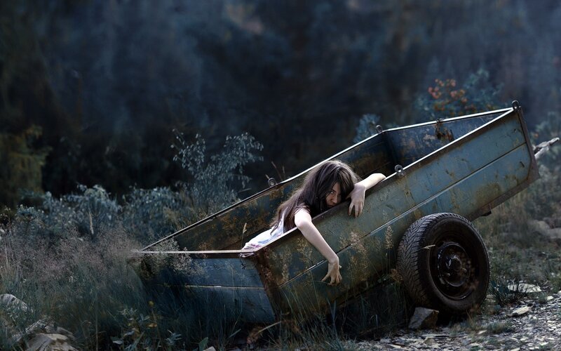 Woman in Overturned Trailer — Blue