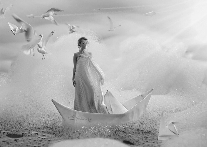 Woman in Paper Boat