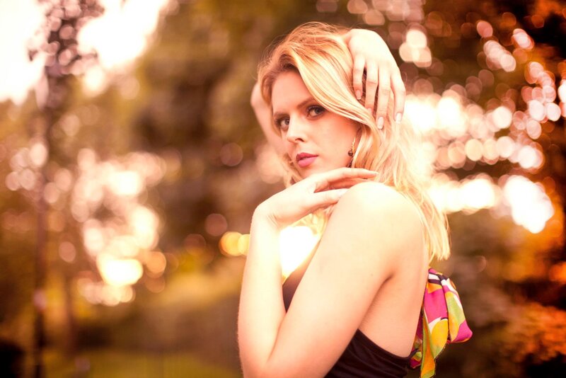 woman in park at sunset