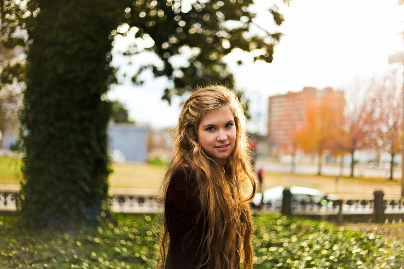 woman in park at sunset