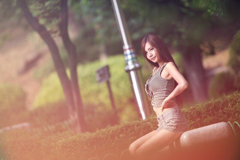 woman in park at sunset