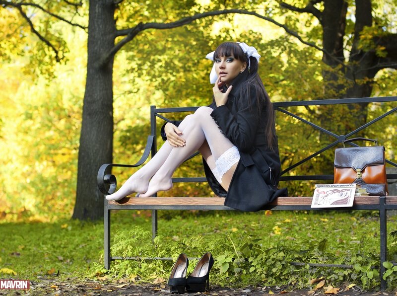 Woman in park on bench