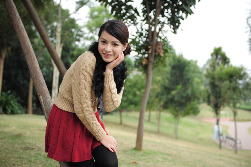woman in park smiling