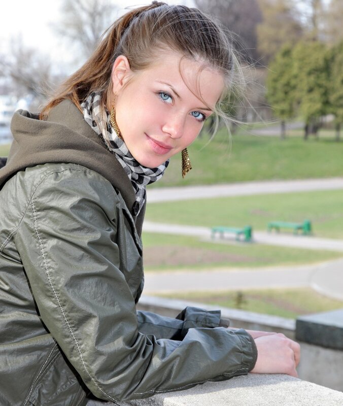 woman in park with blue eyes