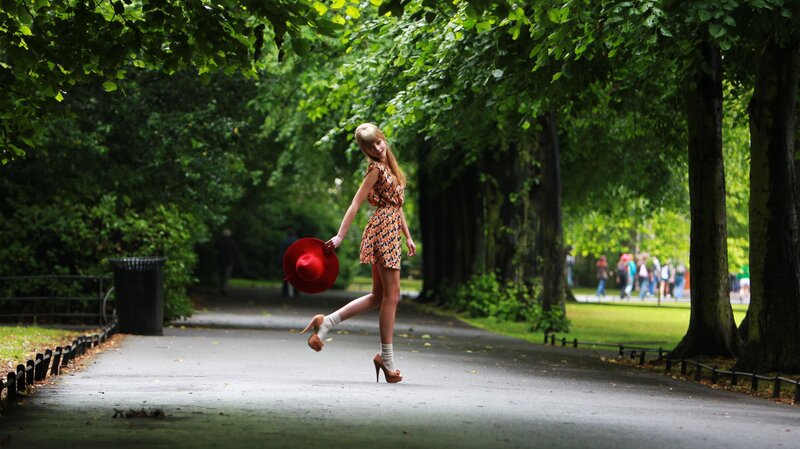 Woman in Park with Hat — Green
