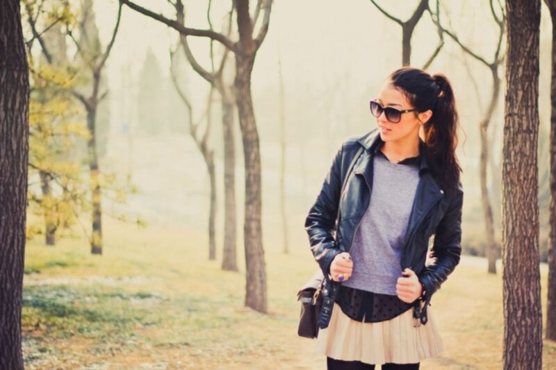 Woman in park with sunglasses