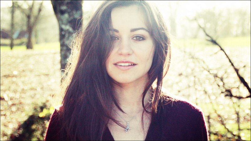 woman in park with sunlight