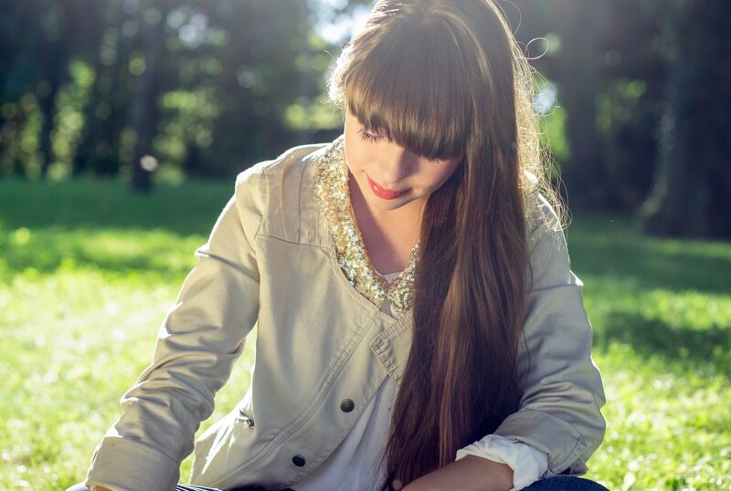 woman in park with sunlight