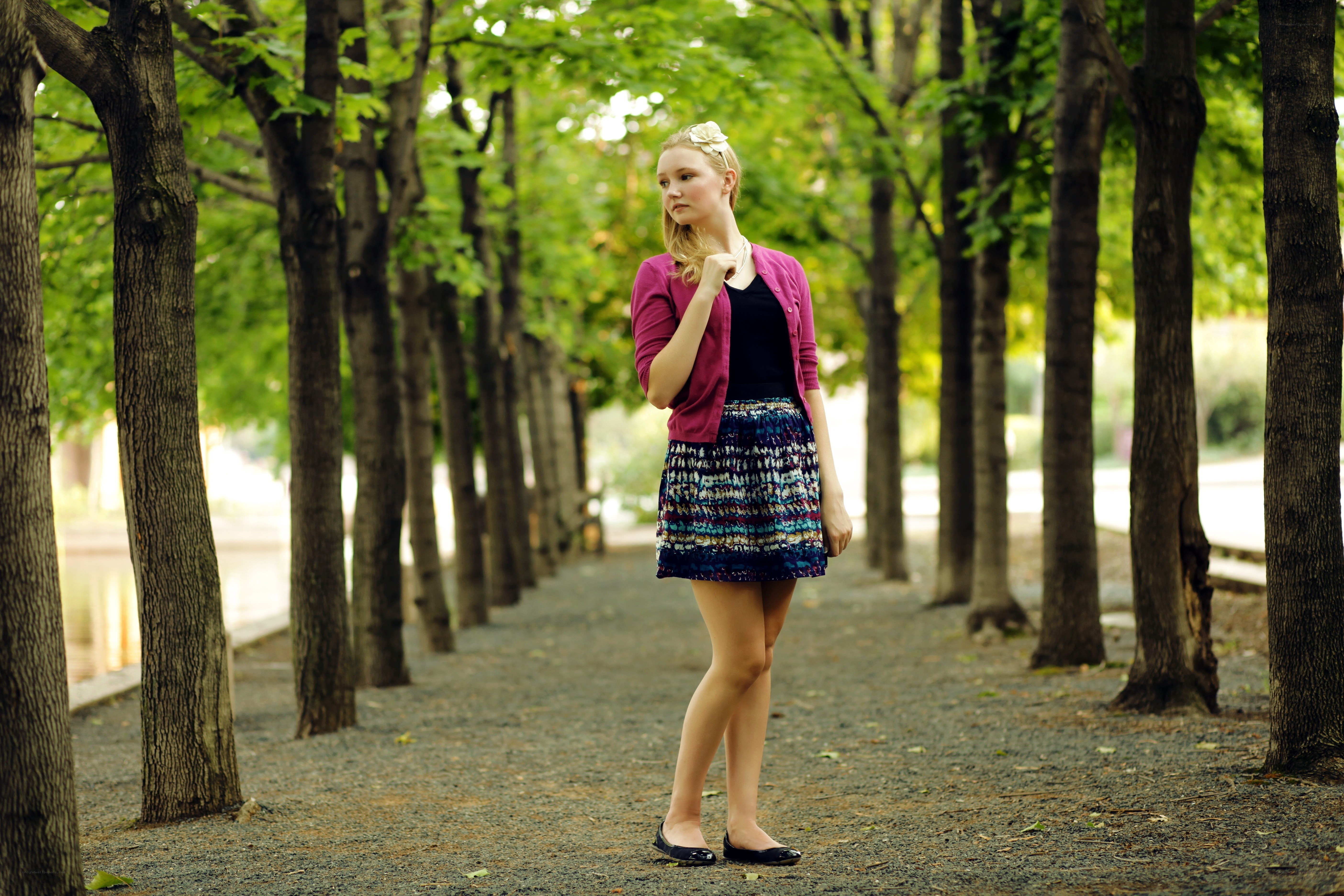 Woman in park with trees