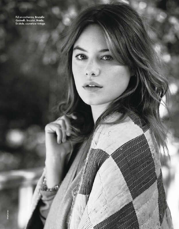 Woman in patchwork jacket